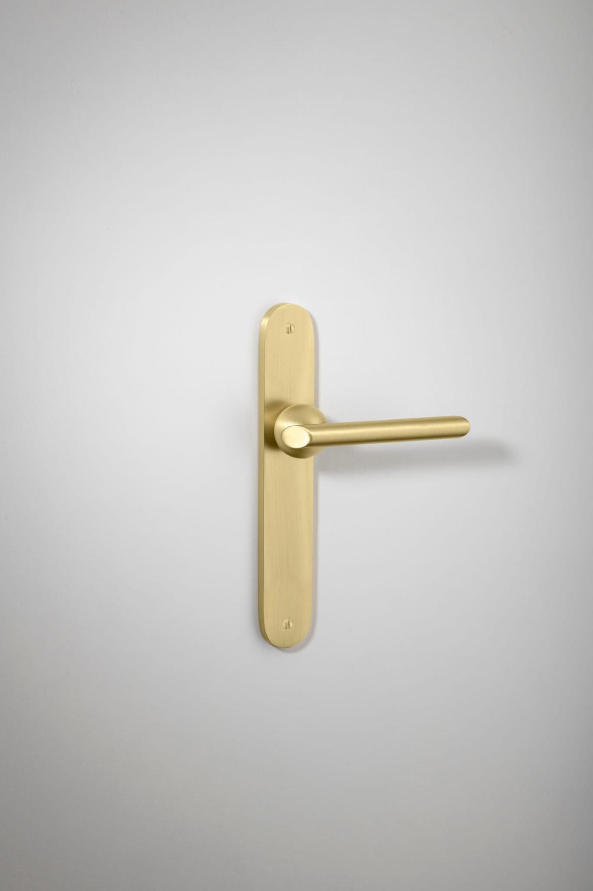 Futurismo Door Lever – Oval Backplate – Champagne PVD – 13436